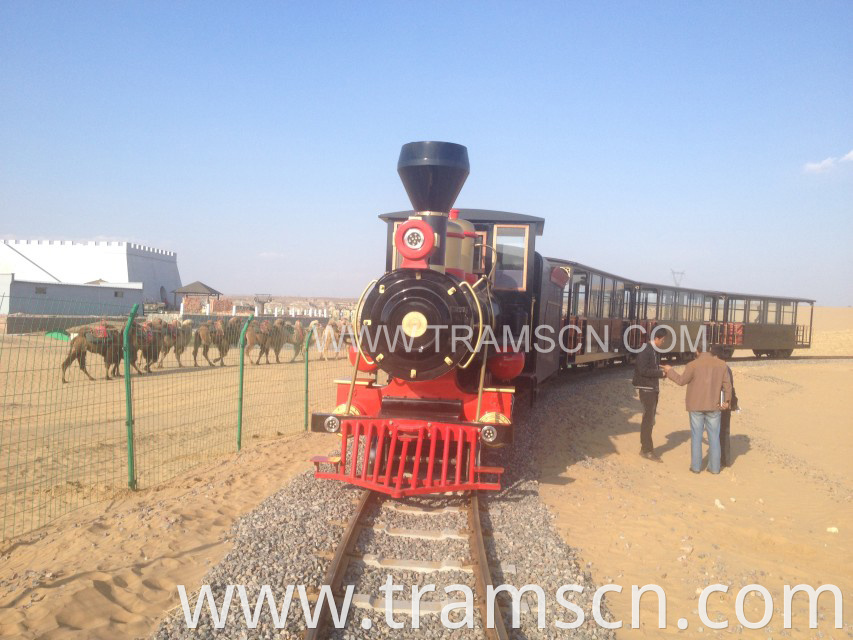 sightseeing train in desert blue sky